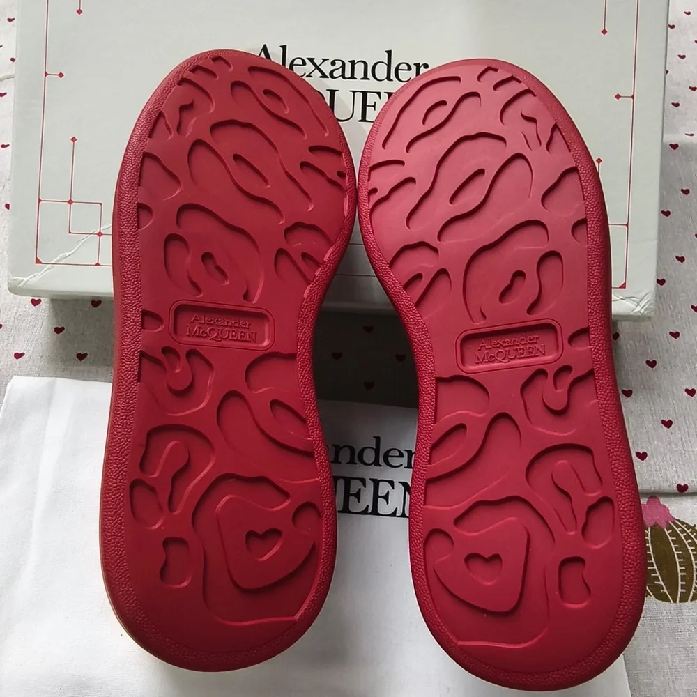 Alexander McQueen Black Leather Sneakers with Red Soles